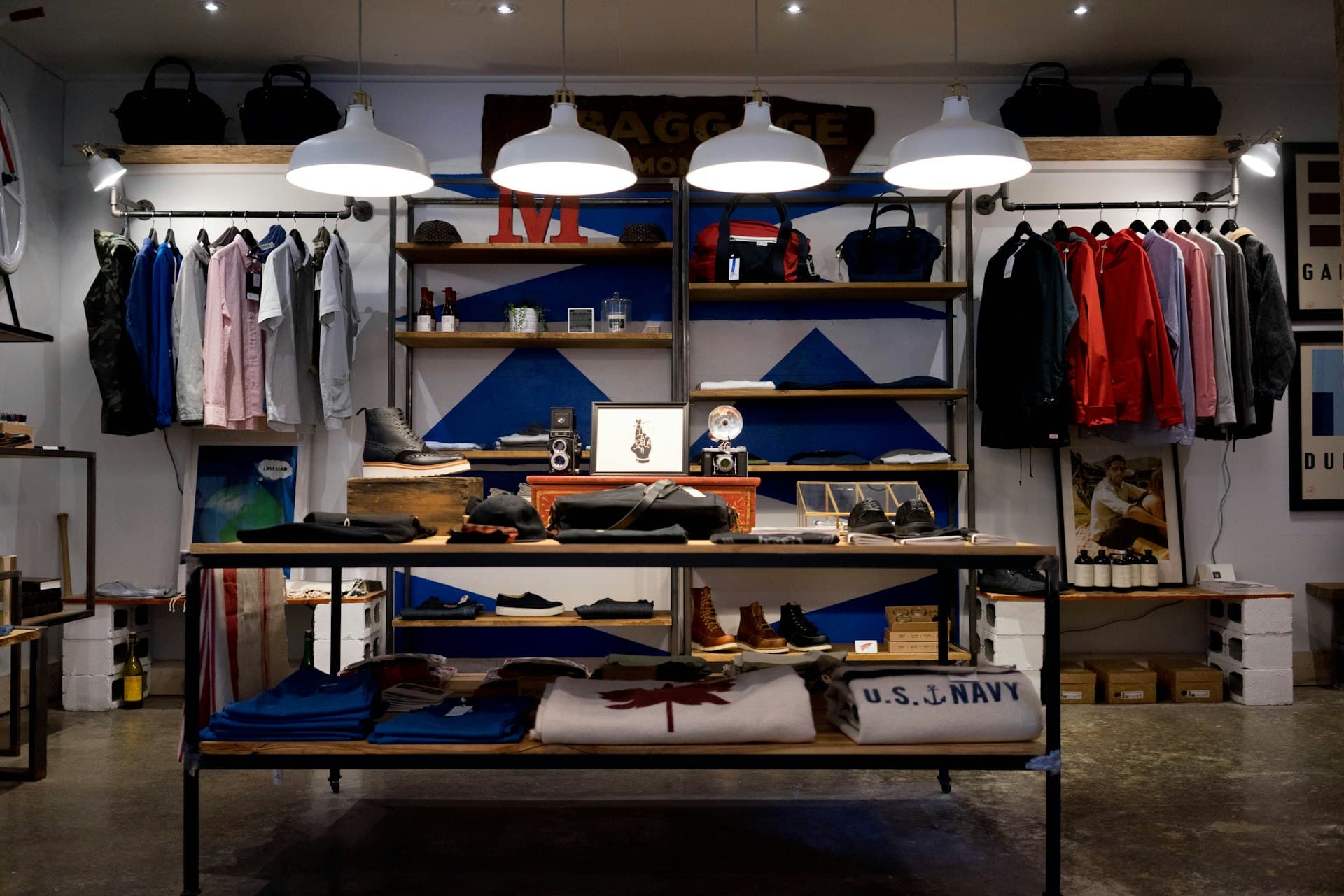 Menswear boutique with shelves and clothing racks